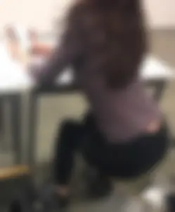 College Candid Girl With a Hot Butt in Black Tight Jeans Sitting at a Desk