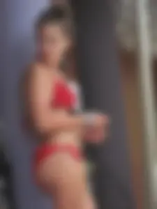 Sexy girl with a nice ass in a red bikini