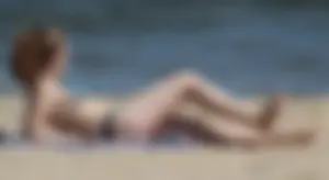 Two sexy beach teens in bikinis, one thick and one skinny with big boobs