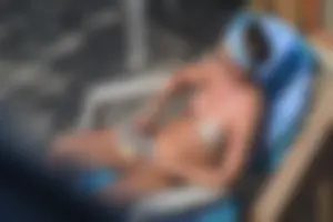 Creepshots of a neighbor milf in a bikini while sunbathing