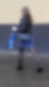 Hot girl wearing a skirt, leather jacket and black pantyhose street creepshot - hot skinny legs