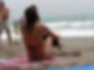 Hot topless girl on the beach in a thong bikini with a nice ass
