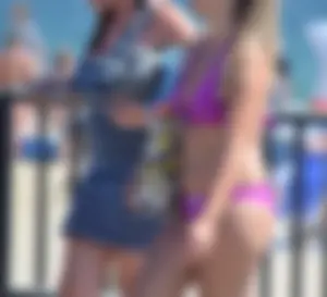 Sexy thick blonde girl in purple bikini