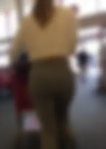 Sexy lady shopping at Target with a big ass in grey leggings