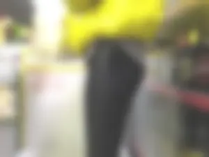 Legs in Leather Pants at the Store Closeup Photos