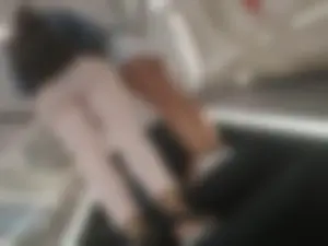Teen in White Mini Shorts Low Angle Escalator Upshorts Photo