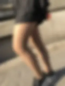 Legs in pantyhose street closeup