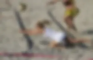 Sexy candid blondie playing beach volleyball creepshot