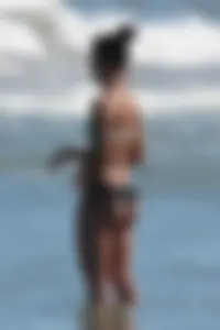 Beach girl out in a bikini with a nice round big booty