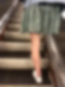 Girl in a Skirt With Thin Legs Standing on a Subway Escalator Low Angle Creepshots Collection