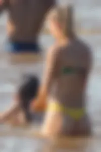 Candid beach girls in thongs