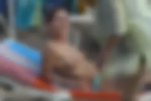 Girls on a nude beach in Sitges, Spain