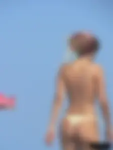 Sexy girls going topless at the beach showing off their sexy bodies