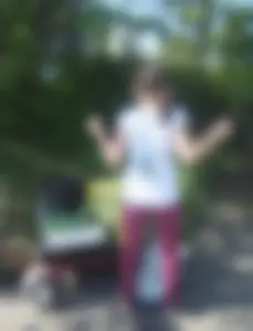 Very skinny girl wearing tight pants outdoors creepshot