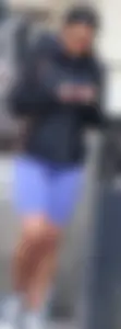 Wide hipped, juicy fronted tanned brunette pawg struts in lycra shorts