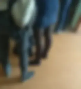 College girls' legs in black pantyhose closeups