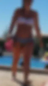 Sexy British girl in a bikini at the pool with camel toe