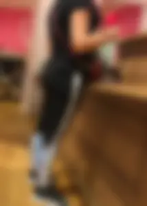 Mature sexy lady in Pink leggings shopping at Pink