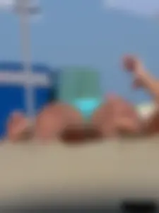 2 topless thonged sexy friends on the beach with great bodies