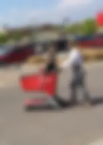 Sexy lady shopping at Target with a big ass in grey leggings