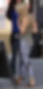 Hot blonde in light leggings after getting Starbucks