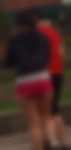 Hot chubby girl in mini shorts with tattooed legs street creepshots