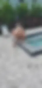 Jacuzzi girl with a nice ass in semi thong bikini and some cleavage