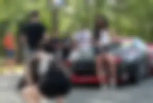 Girls Taking Photos at the Racing Event Candids