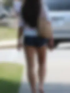 Denim short babe with a wedgie showing some cheeks