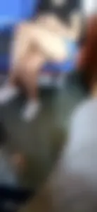 Sexy girl with awesome legs sitting with her legs crossed