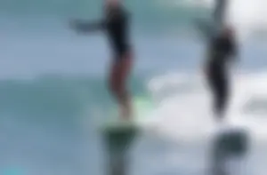Candid surfers in bikinis