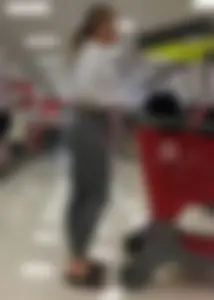 Sexy lady shopping at Target with a big ass in grey leggings