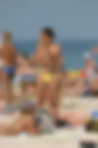 Beach voyeur girls in bikinis, thongs and topless