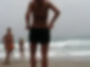 Hot topless girl on the beach in a thong bikini with a nice ass