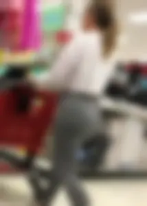 Sexy lady shopping at Target with a big ass in grey leggings