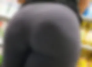 Somalian dollar store employee stocking inventory