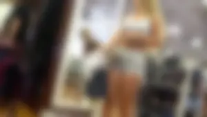 Big booty blonde babe shopping in tiny shorts