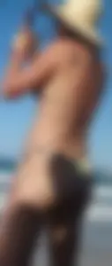 Cute girl on the beach with a decent body in thong bikini