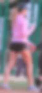 Beautiful skinny girl out for a walk in little shorts
