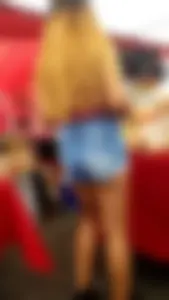 Latin teen with cute braces in shorts…