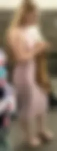 Blonde college girl with a baby face in a very tight dress