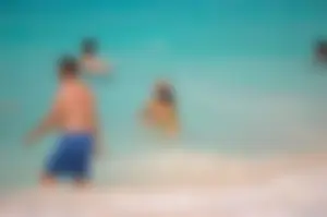 Assortment of sexy babes at the beach in bikinis