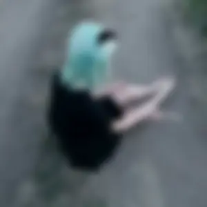 Skinny Barefoot Teen With Blue Hair Sitting on the Road