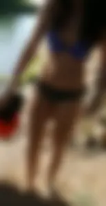 Girl With Sexy Body in Swimsuit on the Riverbank Creepshot