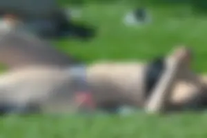Cute blonde teen laying out in her bikini