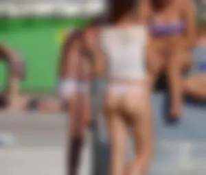 Sexy big bootied Latino girl in see thru underwear thong and white top with no bra
