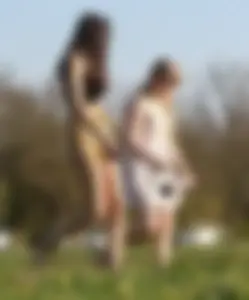 Talking to two cute candid German girls in shorts