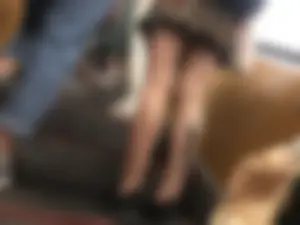 Candid Girl in a Skirt With a Tattoo on Her Calf Subway Escalator Creepshots Gallery