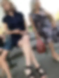 Very cute teen candid girl in a dress sitting on a bus stop creepshots