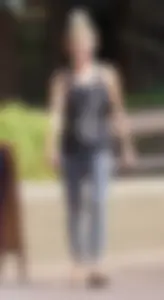 Skinny blonde in grey leggings with a friend